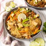 A hearty plate full of vegan pancit bihon on the dining table.